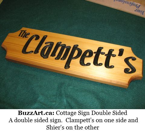 A double sided sign.  Clampett's on one side and Shier's on the other